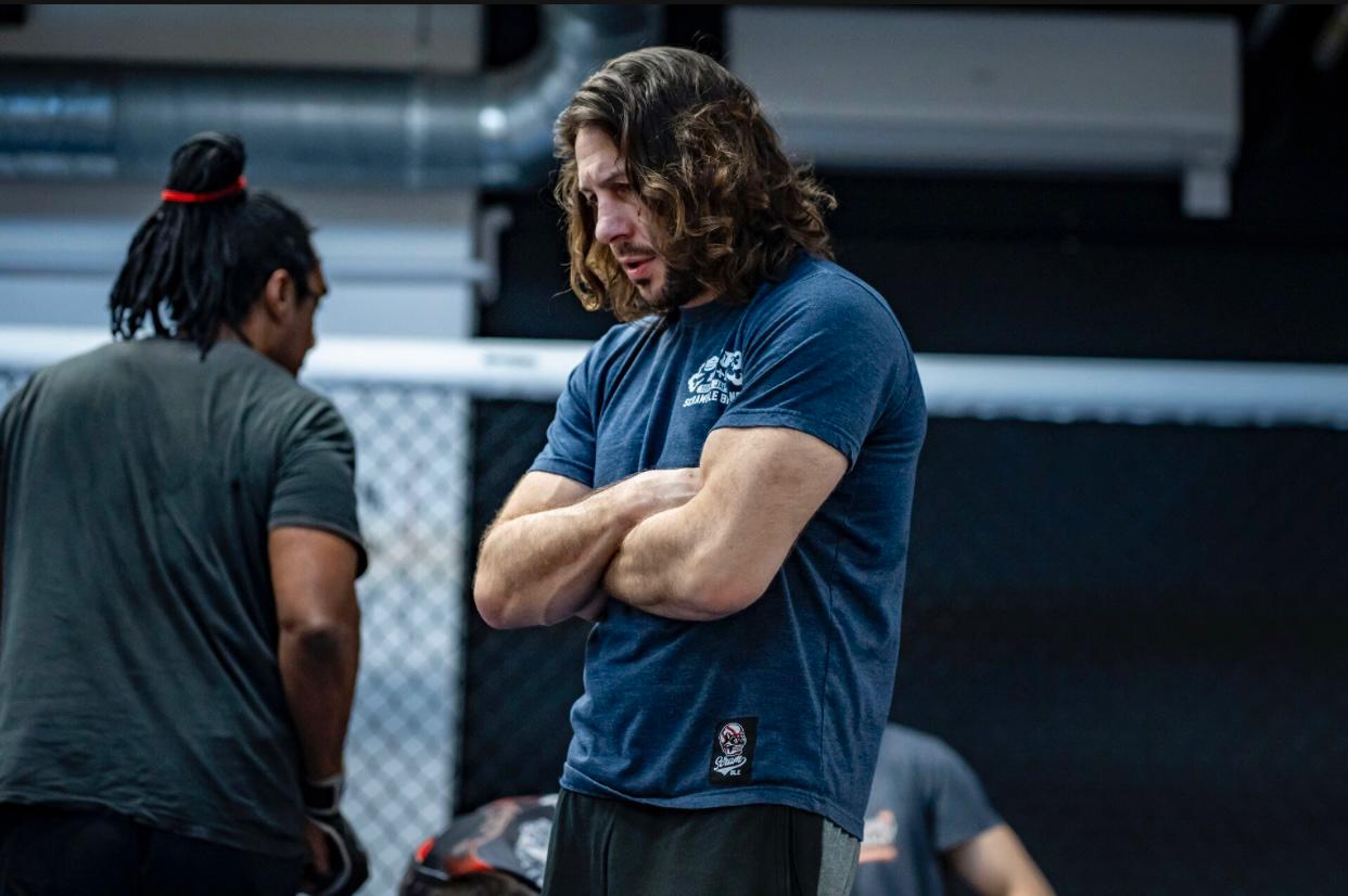 Ash Grimshaw coaching in the gym